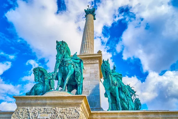 The bronze statues of the seven Magyar leaders are mounted on the base of the column of Heroes\' Square, Budapest, hungary