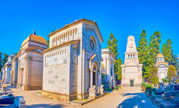 The stone mausoleums of local notable families are the main landmarks of Memorial Cemetery of Milan, Italy