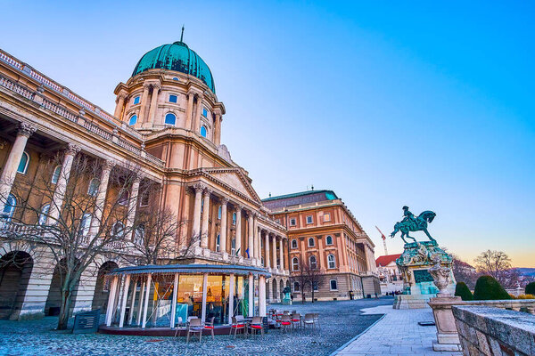 Danube terrace of Castle Hill with equestrian monument to Prince Eugene of Savoy and the main facade of Buda Castle, Budapest, Hungary