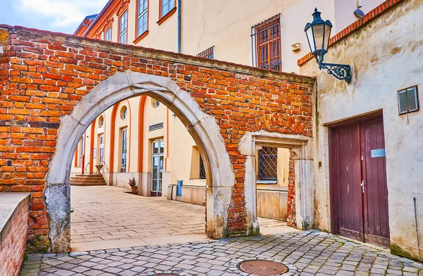 The preserved historic brick arch on the territory of Cathedral of St Peter and Paul in Brno, Czech Republic