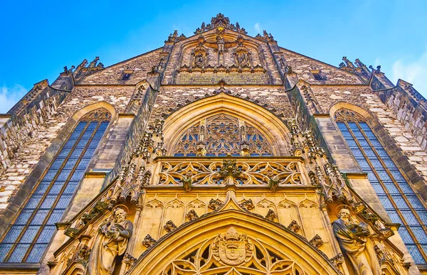 Gothic styled main facade of Brno\'s Cathedral of Saints Peter and Paul with stone decorations, Czech Republic