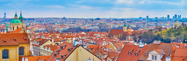 Panorama of the red tile roofs of historic townhouses of Lesser Quarter (Mala Strana) from the Prague Castle, Czech Republic