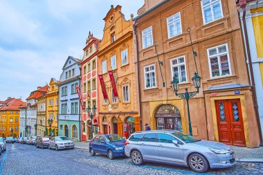 PRAGUE, CZECH REPUBLIC - MARCH 6, 2022: The medieval dense townhouses, stretching along Nerudova Street in Lesser Quarter, on March 6 in Prague