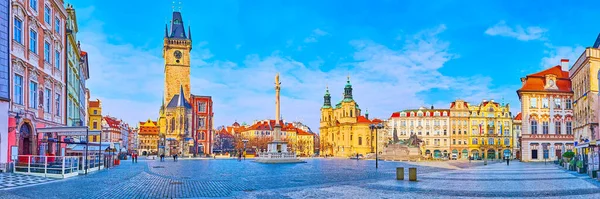 Panoramic view of Old Town Square with ornate townhouses, Old Town Hall, Marian Column, St Nicholas Church, museums and restaurants, Prague, Czech Republic