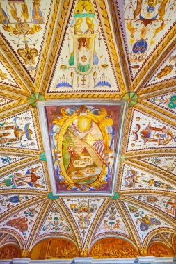 CERTOSA DI PAVIA, ITALY - APRIL 9, 2022: The vault of Studiolo with scenic frescoes, Certosa Museum, on April 9 in Certosa di Pavia, Italy