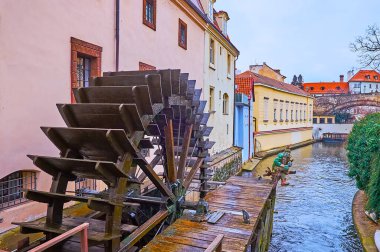 Certovka Canal (Devil's Canal) with a wooden wheel of the Smeltery Water Mill (Mlyn Hut), Lesser Quarter, Prague, Czech Republic