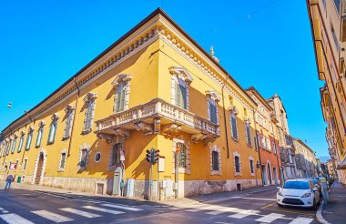 Historic facade and the corner of carved medieval mansion, Brescia, Lombardy, Italy
