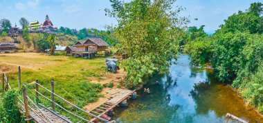 Panorama of Sa-Nga River with Su Tong Pae Bamboo Bridge and lush greenery, Mae Hong Son suburb, Thailand