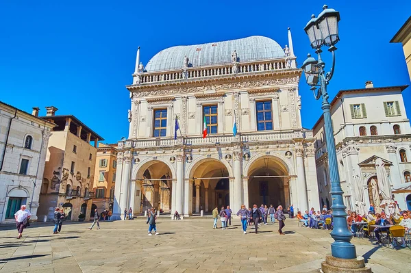 BRESCIA, ITALY - APRIL 10, 2022: The elegant Renaissance Palazzo della Loggia palace, located on the Piazza della Loggia square in the old town center, on April 10 in Brescia