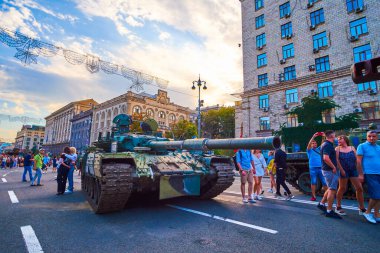 KYIV, UKRAINE - AUGUST 23, 2022: People walk among captured Russian tanks on street exhibition of destroyed Russian military vehicles, Independence Day, on August 24 in Kyiv, Ukraine