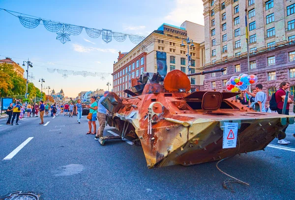 KYIV, UKRAINE - AUGUST 23, 2022: The crowded Khreshchatyk Avenue during the exhibition of destroyed Russian military equipment, on August 24 in Kyiv, Ukraine