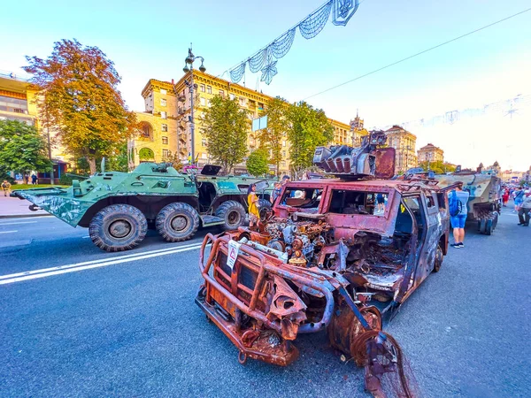KYIV, UKRAINE - AUGUST 23, 2022: Burnt Russian Tigr military vehicle on Khreshchatyk Avenue, on August 24 in Kyiv, Ukraine
