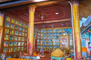 MAE HONG SON, THAILAND - MAY 6, 2019: The glass paintings of Phra Vejsandon Jakata (Tales of Previous lives of Buddha), Wat Chong Klang Temple, on May 6 in Mae Hong Son