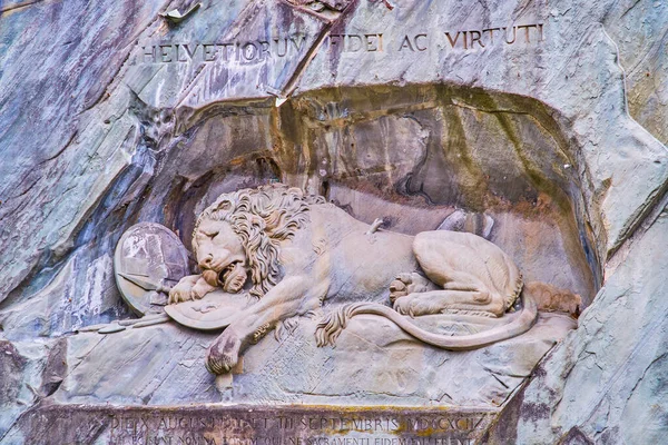 Lion Monument (Lowendenkmal) carved in a rocky cliff is the most famous monument of Switzerland and a visit card of Lucerne city