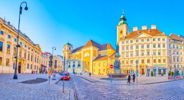VIENNA, AUSTRIA - 17 Şubat 2019: Freyungplatz 'da tarihi binalar ve Avusturya çeşmesiyle panoramik manzara, 17 Şubat' ta Viyana, Avusturya
