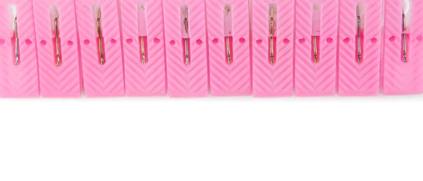 pembe ve beyaz clothespins ile whitel adam satır düzenlenmiş