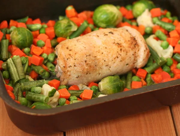 Stuffed chicken breast roll with vegetables — Stock Photo, Image