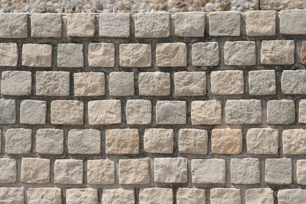 Fundo da textura da parede de tijolo de arenito — Fotografia de Stock