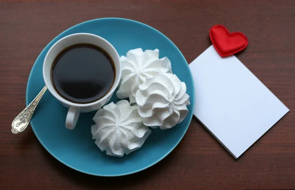 Mensaje del corazón y taza de café Imagen de archivo