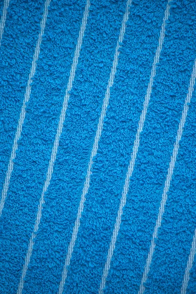 Текстура поверхности синего полотенца, крупным планом — стоковое фото