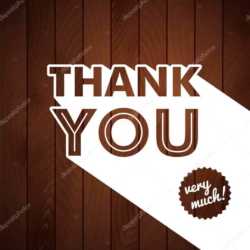 Thank you card with typography on a wooden background.