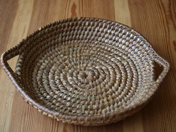 Knitted old wooden bowl — Stock Photo, Image