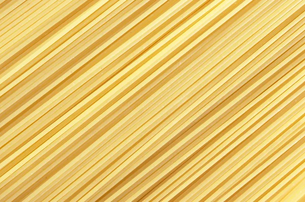 Background with closeup of spaghetti pasta — Stock Photo, Image