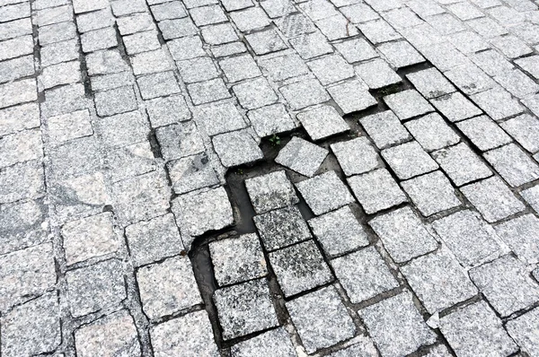 Paving stones broken and cracked — Stock Photo, Image