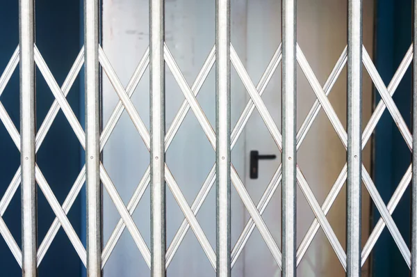 Rolling shutters closed in shop — Stock Photo, Image