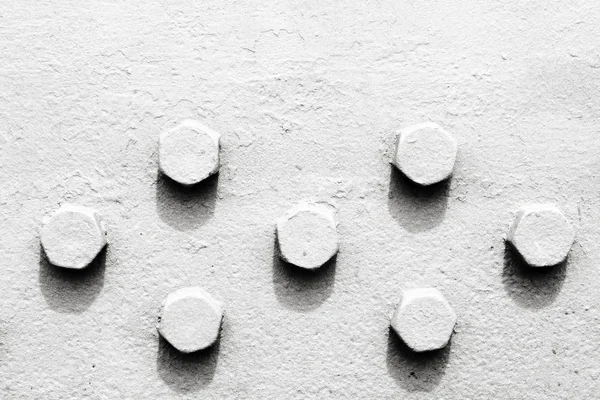 Abstração em preto e branco com cabeças de parafuso — Fotografia de Stock