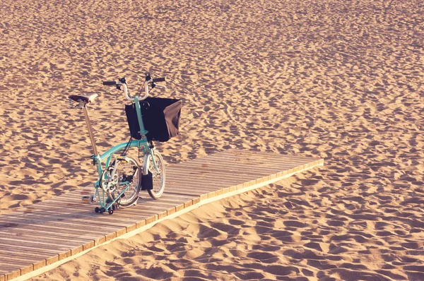 Four wheel bicycle on beach — Stock Photo, Image