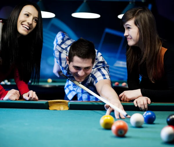 Friends playing billiard — Stock Photo, Image