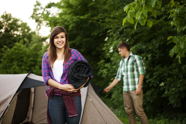 Woman with sleeping bag — Stock Photo, Image