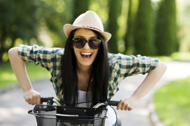 Woman with bicycle clipart