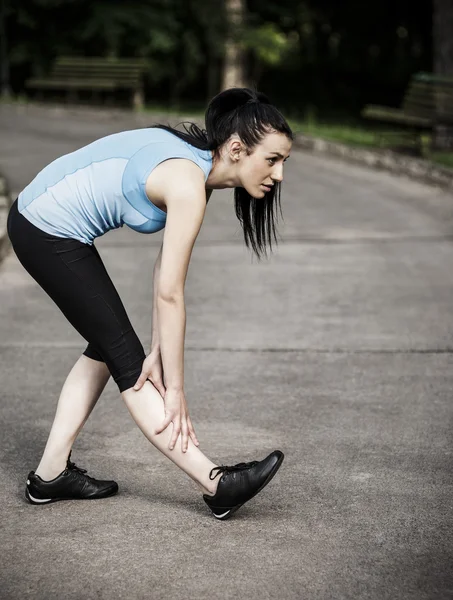 Young woman stretching — Stock Photo, Image