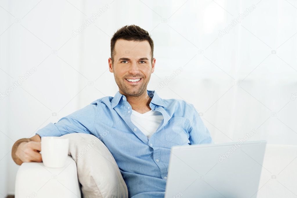 Handsome man with laptop