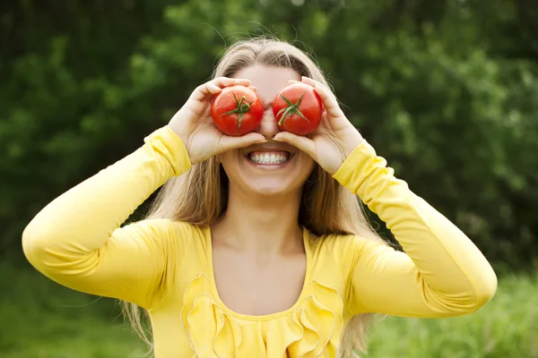 Fooling around with tomatoes — Stock Photo, Image