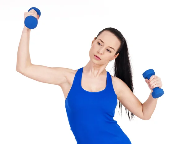 Focus woman exercising with dumbbells — Stock Photo, Image