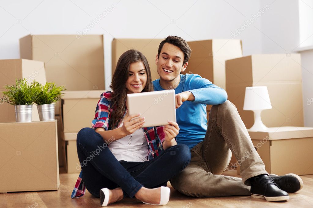 Couple unpacking their stuff