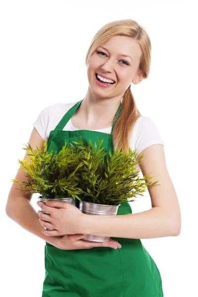 Feliz jardinero hembra con su planta — Foto de Stock