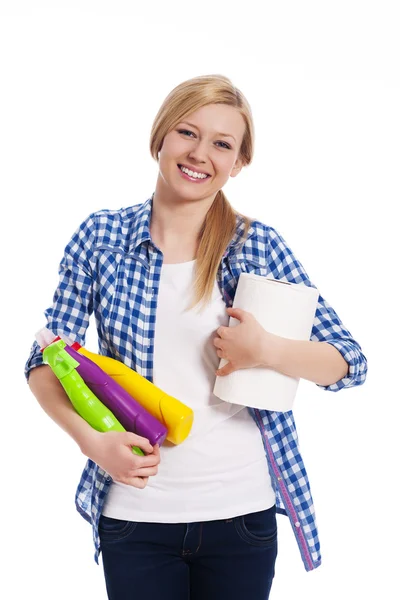 Happy blonde woman holding cleaning equipment — Stock Photo, Image