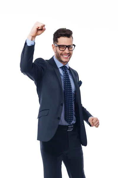 Young businessman enjoys the winning — Stock Photo, Image