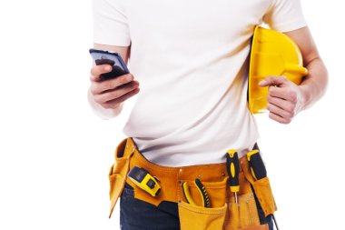 bir cep telefonu kullanarak inşaat işçisi Close-Up