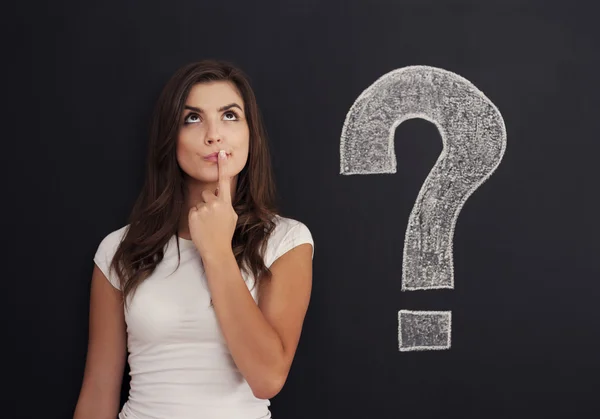 Woman with question mark on blackboard — Stock Photo, Image