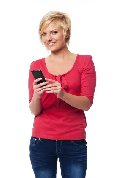 Pretty woman text messaging — Stock Photo, Image