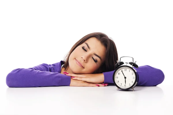 Sleeping beautiful woman with alarm clock — Stock Photo, Image