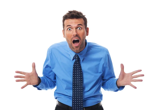 Angry businessman screaming into camera side — Stock Photo, Image