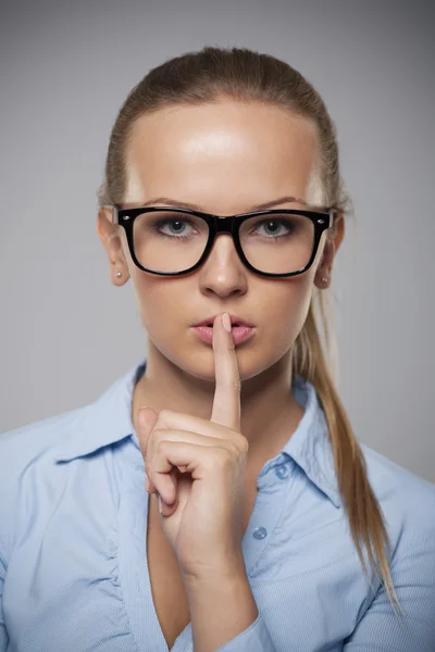 Serious woman wearing glasses — Stock Photo, Image