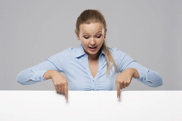 Beautiful businesswoman pointing — Stock Photo, Image