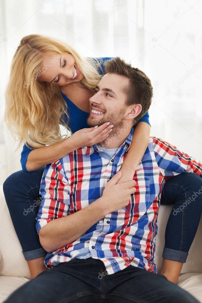 Loving couple spending free time together at home
